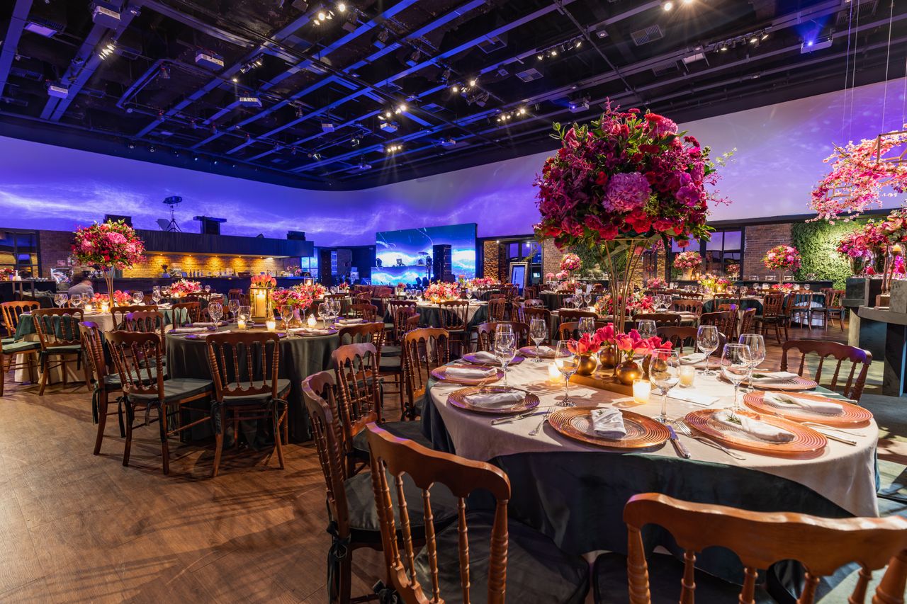 The Art of Drawing Readers In: Your attractive post title goes here Luxurious wedding reception setup with elegant floral arrangements, setting a grand and festive atmosphere indoors.